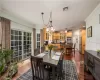 Living room featuring a baseboard radiator and dark hardwood / wood-style flooring