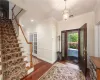 Bathroom featuring vanity, an enclosed shower, ornamental molding, and tile patterned floors