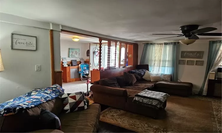 Living room featuring ceiling fan