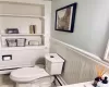 Bathroom featuring toilet and tile patterned floors