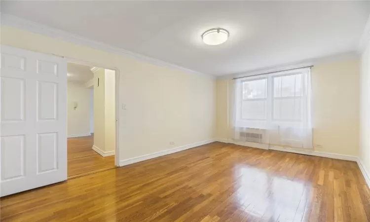 Unfurnished bedroom, hardwood floors