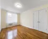 Empty room with  hardwood flooring