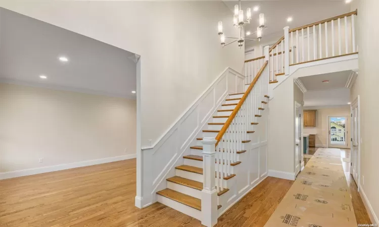 Two Story entry Hallway with double Coat Closet