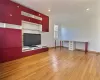 Unfurnished living room featuring light hardwood / wood-style floors