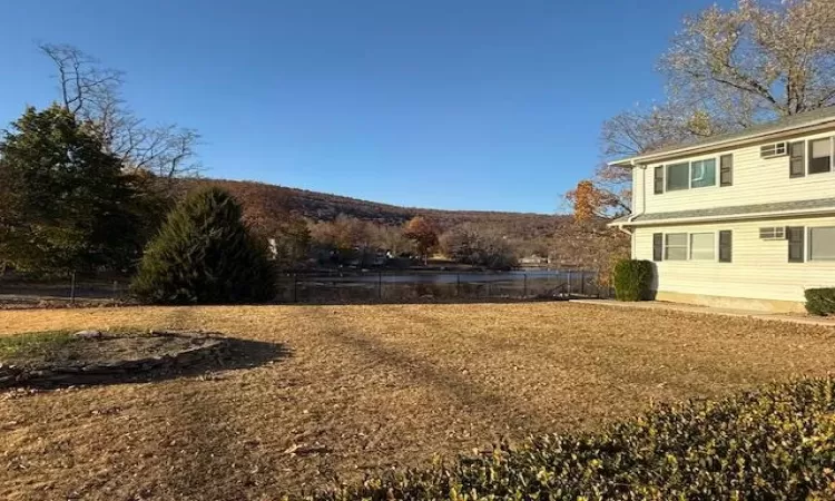 View of yard with a mountain view