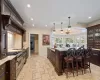 Custom Walnut Cabinetry | Limestone & Marble Countertops