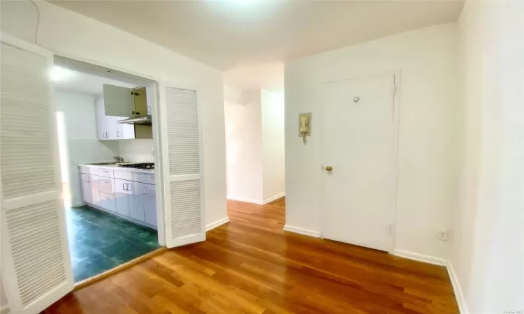 Hallway featuring hardwood / wood-style flooring