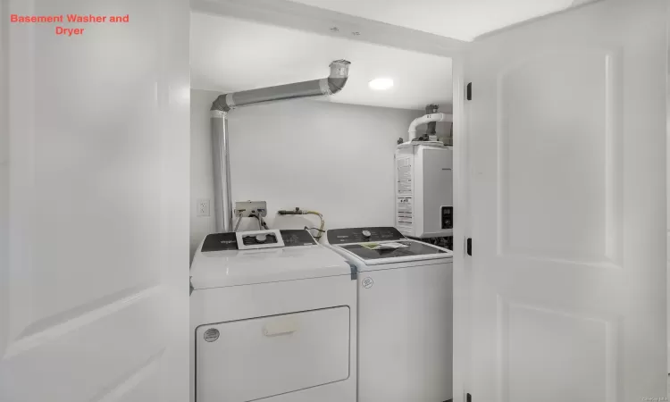 Laundry room featuring washer and dryer