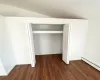 Closet with a baseboard radiator