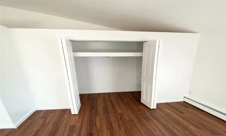 Closet with a baseboard radiator