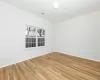 Spare room with light hardwood / wood-style floors