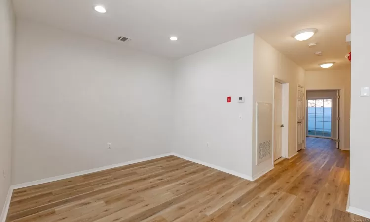 Spare room with light hardwood / wood-style flooring