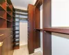 Unfurnished bedroom featuring a closet and light carpet