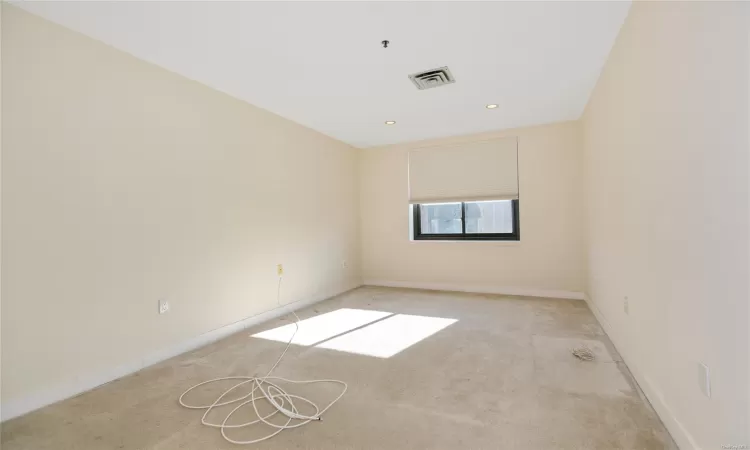 Full bathroom with toilet, tile patterned floors, vanity, and enclosed tub / shower combo