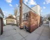 View of side of home with a patio area