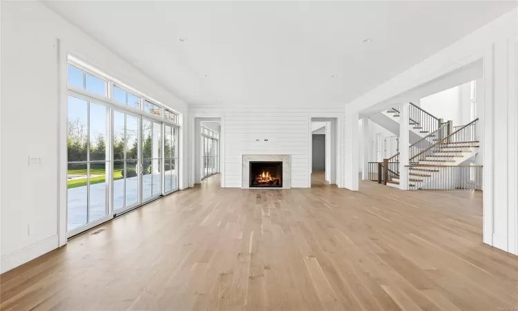 Unfurnished living room featuring light hardwood / wood-style flooring