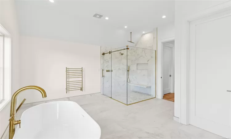 Bathroom featuring plus walk in shower