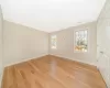 Spare room with light hardwood / wood-style floors