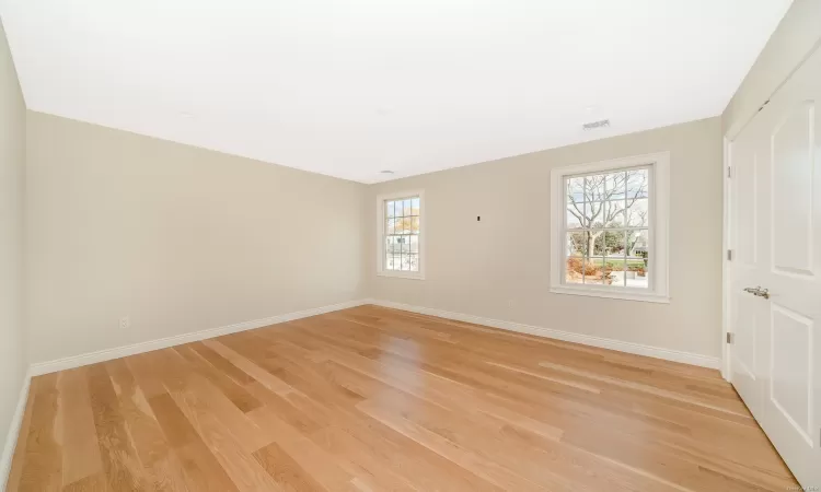 Spare room with light hardwood / wood-style floors