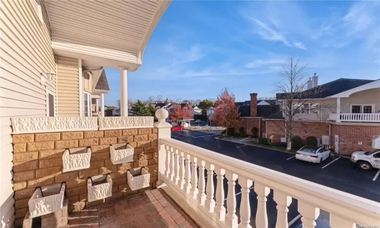 Private Balcony w/ planters overlooking clubhouse