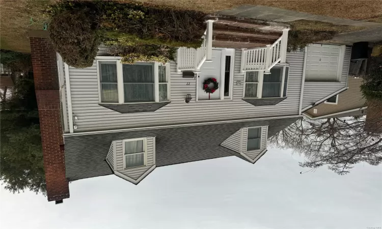 Cape cod-style house with a garage