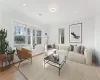 Sunroom / solarium featuring lofted ceiling with beams and a healthy amount of sunlight