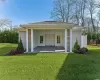 Bedroom with crown molding and light hardwood / wood-style floors