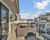 Wooden deck featuring outdoor lounge area