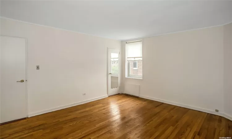 Office with hardwood / wood-style floors