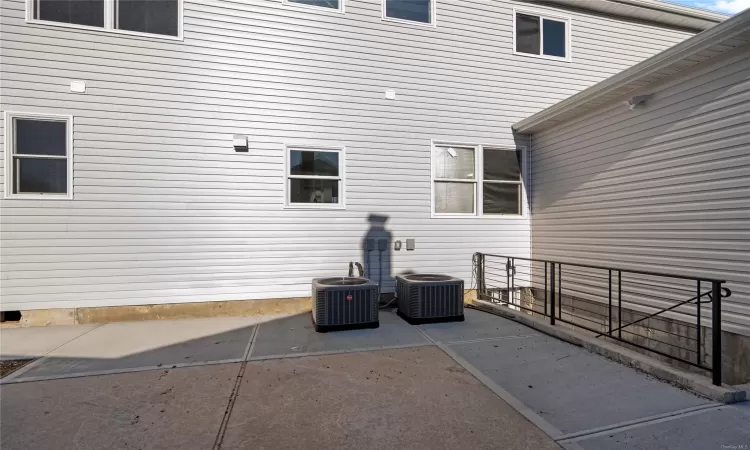 View of patio featuring central AC unit