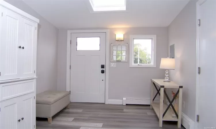 Ent Hall W/Grey Wash Wide Plank Flooring & Skylight