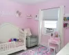 Bedroom W/Grey Wash Wide Plank Flooring