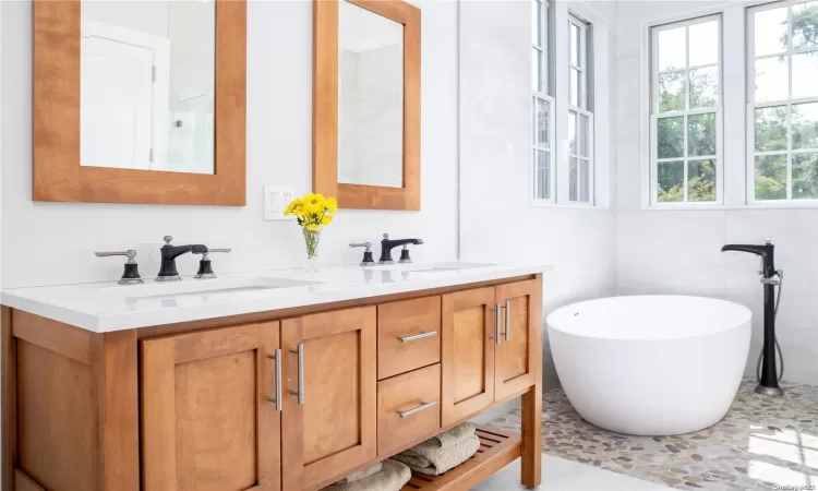 Primary bath with double vanity, free standing soaking tub