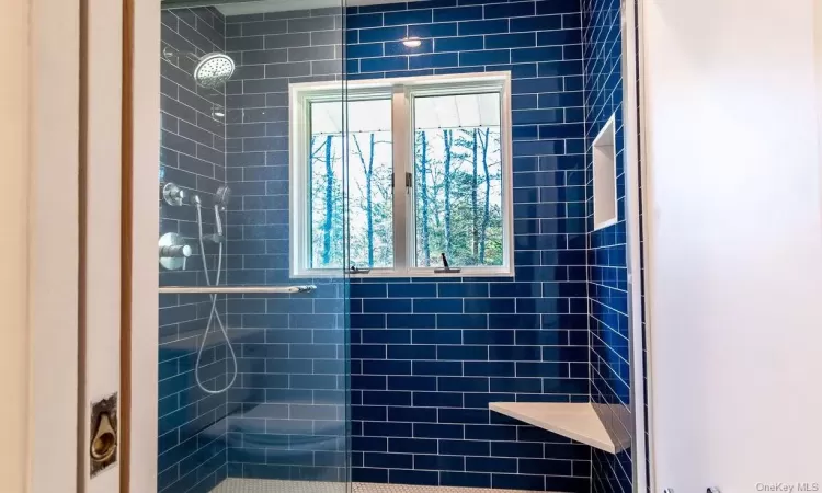 Bathroom with tiled shower