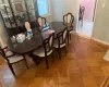 Dining room featuring parquet floors