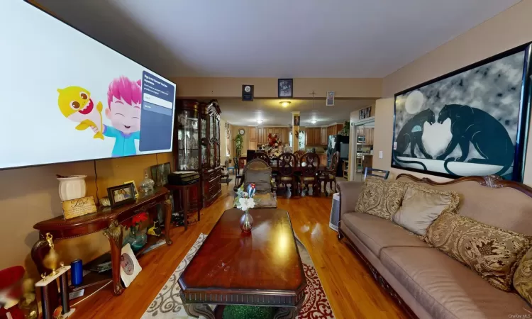 Living room featuring hardwood / wood-style flooring