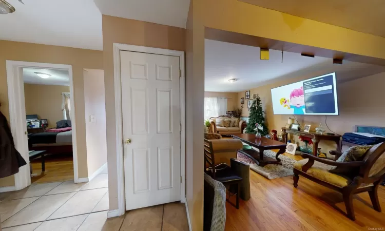 Living room with light hardwood / wood-style flooring