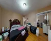 Bedroom with a closet and light wood-type flooring