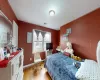 Bedroom featuring light wood-type flooring