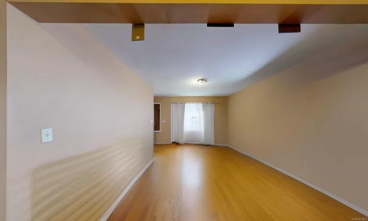 Spare room featuring light hardwood / wood-style flooring