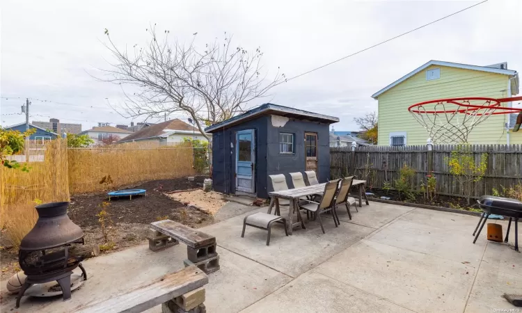 Back yard fire pit and BBQ area