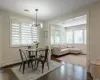 Dining Room open to Sunlit Den