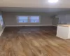 Kitchen featuring butcher block countertops, dishwasher, and fridge