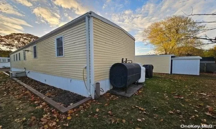 Full bathroom with vanity, toilet, and shower / tub combo with curtain