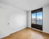 Empty room featuring light hardwood / wood-style flooring and a textured ceiling