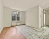 Empty room featuring light hardwood / wood-style flooring