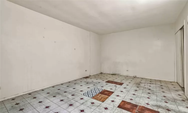 Spare room featuring hardwood / wood-style floors