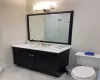 Bathroom with vanity and walk in shower