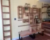 Special crafted ladder to access upper shelving