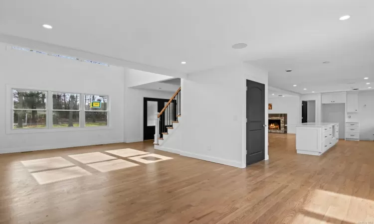 Unfurnished living room featuring light hardwood / wood-style flooring